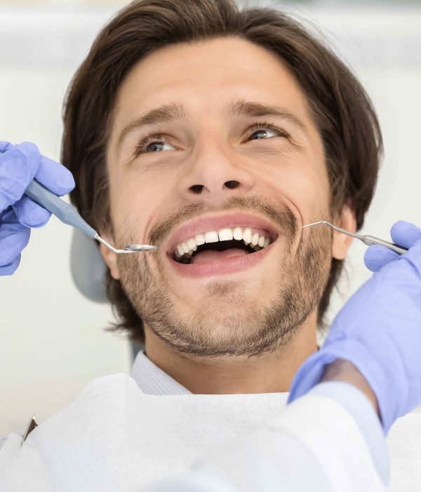 Smiling happy girl on white background. Photo of pretty girl with perfect skin. Beauty & Skin care concept